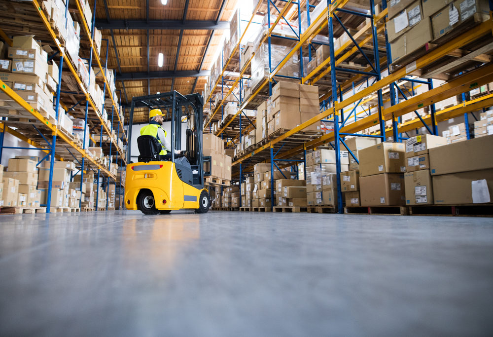 Forklift Accident Takes Life Of 5-Year-Old Child A forklift moving amongst shelves full of boxes in a warehouse