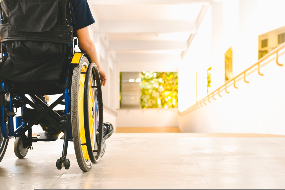 Bombshell Lawsuit Alleges Decades of Abuse by Special Olympics Maine Founder, Melvin “Mickey” Boutilier, Ignored By Organization Asian special child on wheelchair is pushing his car on the ramp for the disabled.
