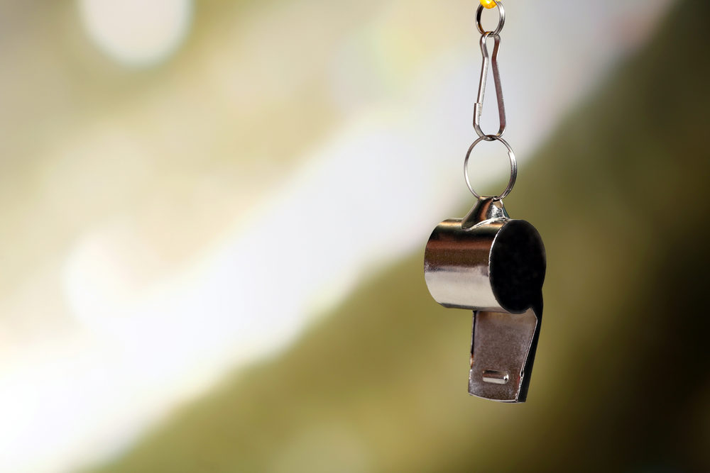 whistle closeup with abstract background