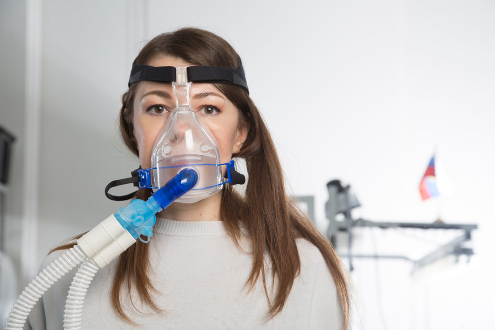 woman in hospital using an Apparatus for artificial lung ventilation