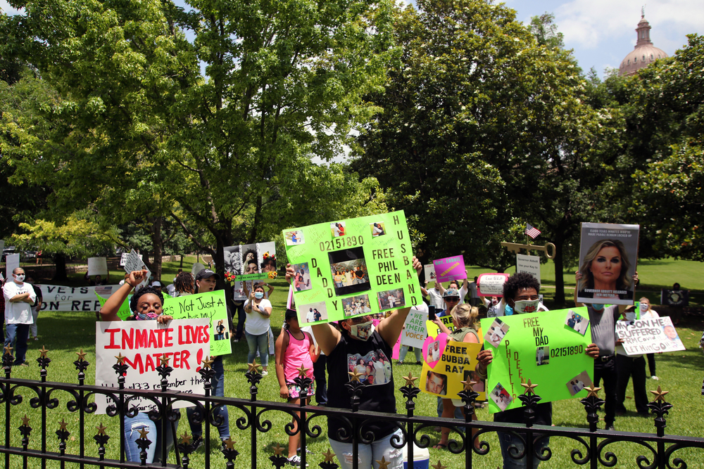 Family members of prisoners held in the state prison system demonstrate at the Governor's Mansion for their release on parole due to the danger of Covid-19 in prisons.