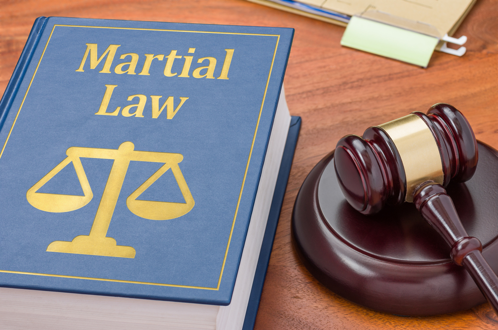 A law book with a gavel - Martial law