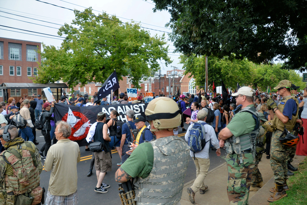 Militia, white supremacists and counter-protesters during a white nationalist rally that turned violent resulting in one death and multiple injuries.