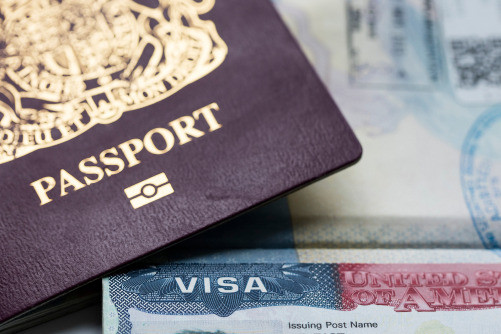 Close up of a Visa document and passport.