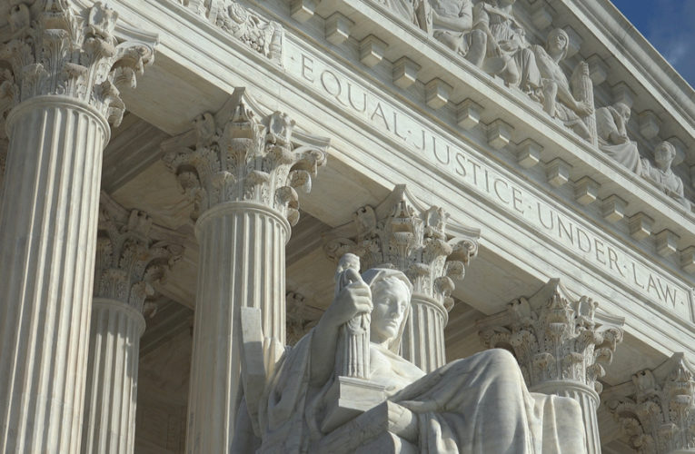 Equal Justice Under Law engraving above entrance to US Supreme Court Building.