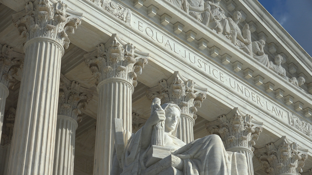 Equal Justice Under Law engraving above entrance to US Supreme Court Building.