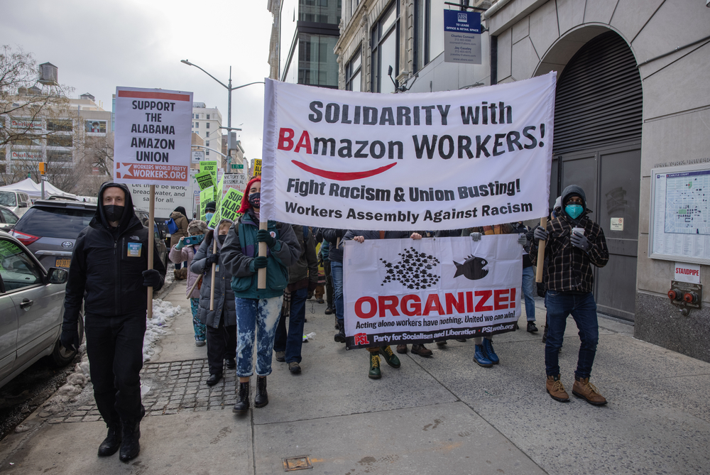 Demonstrators march in Manhattan in support of Amazon warehouse workers in Bessemer, Alabama who are seeking to form a union.