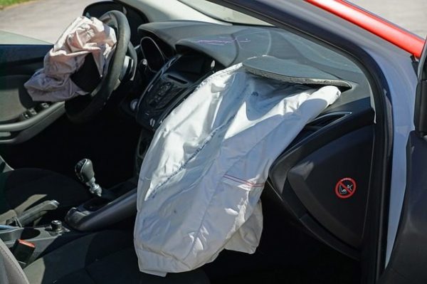 Driver and passenger side airbags deployed from a sefan after a crash