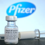 Bottle of Pfizer-BioNTech Covid-19 vaccine with Pfizer trademark