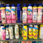 Sunscreen display in a retail store including brands for kids and babies