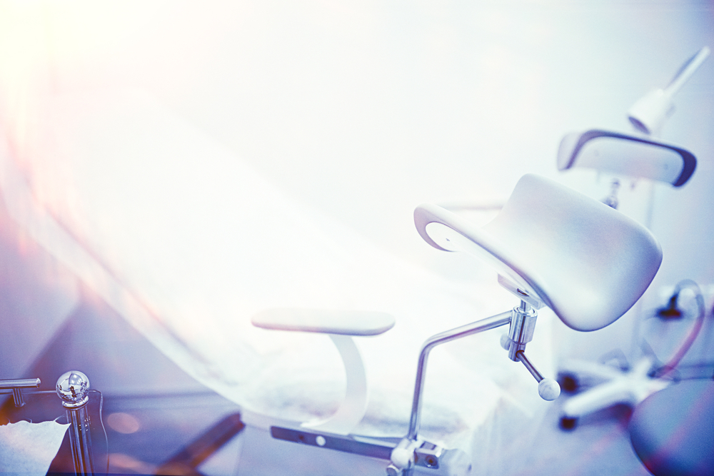 gynecologist chair with light shining behind