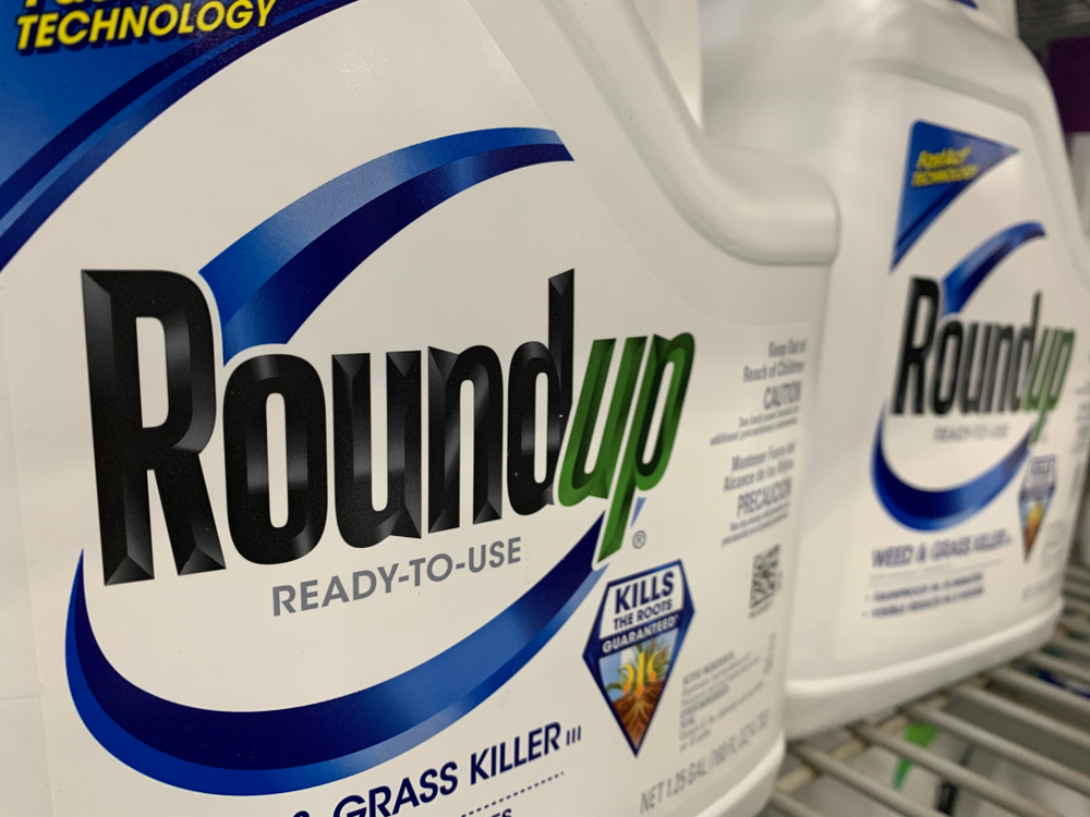 Bottles of Roundup Weed Killer on Home Improvement Store Shelf