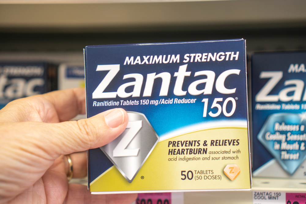 hand holding Over the counter Zantac used for acid reflux and heartburn