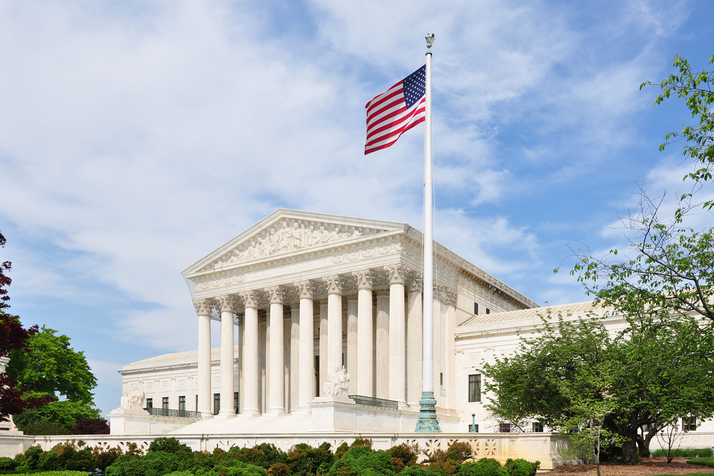 The front facade of the United States Supreme Court in Washington, DC, USA.