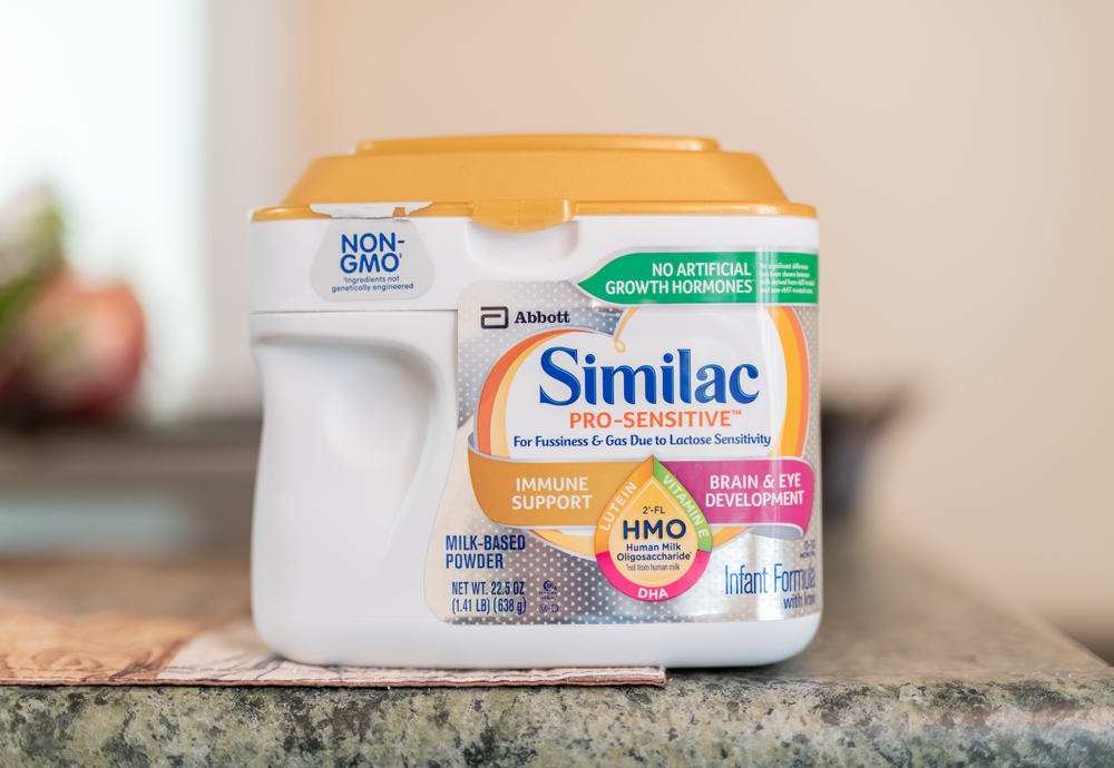 Similac baby formula on kitchen counter