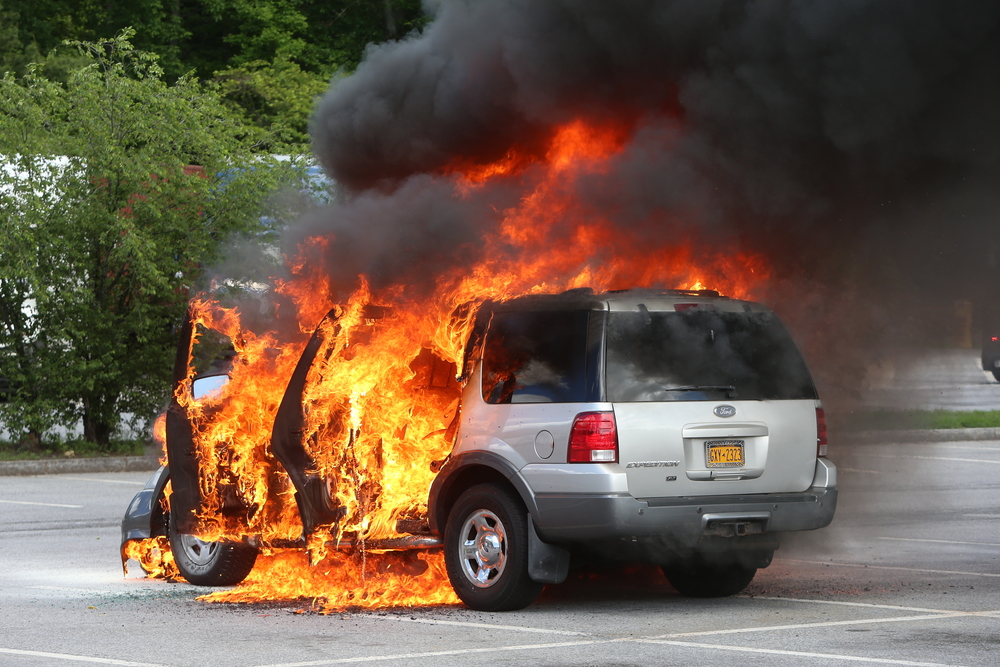 ford expedition on fire in New york state parking lot