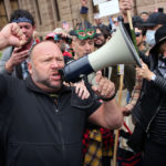 Alex Jones addresses demonstrators protesting Covid-19 stay at home orders