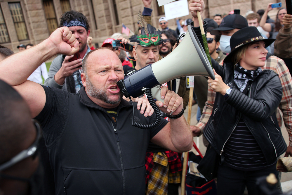 Alex Jones addresses demonstrators protesting Covid-19 stay at home orders