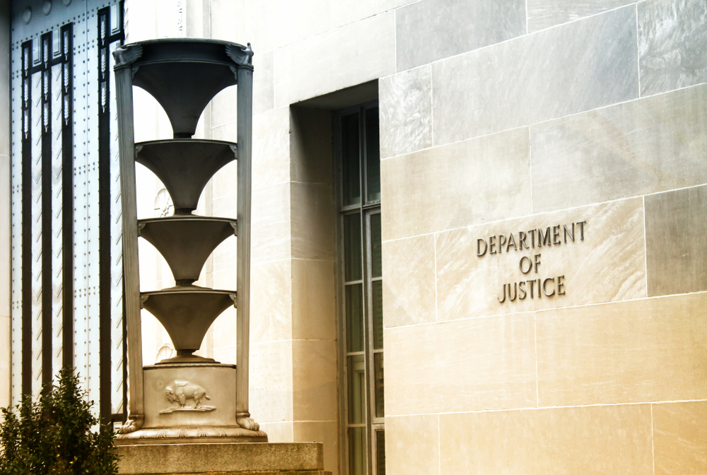 front of the U.S. Department of Justice building in Washington, DC