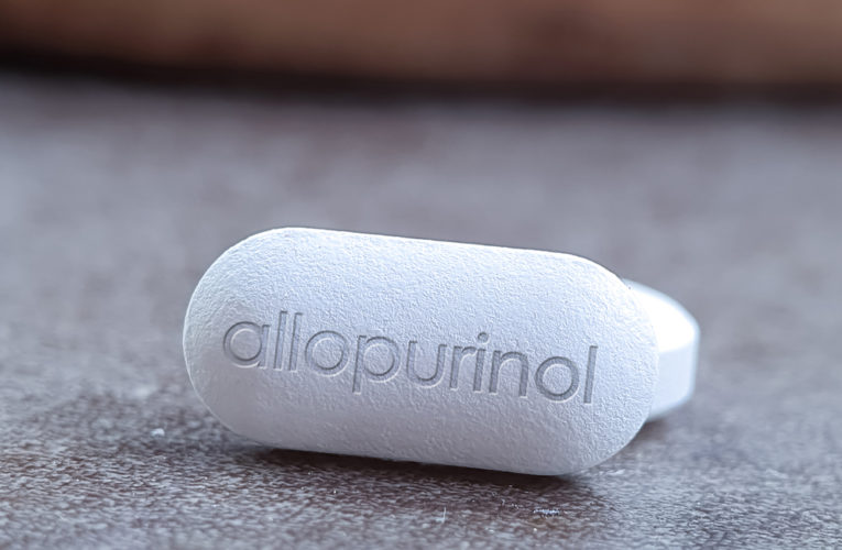 Allopurinol tablet close up of drug medication used to decrase high blood uric acid levels and to prevent gout and kidney stones and in chemotherapy