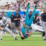 raiders player tackles jaguars player at TIAA Bank Field, jacksonville stadium