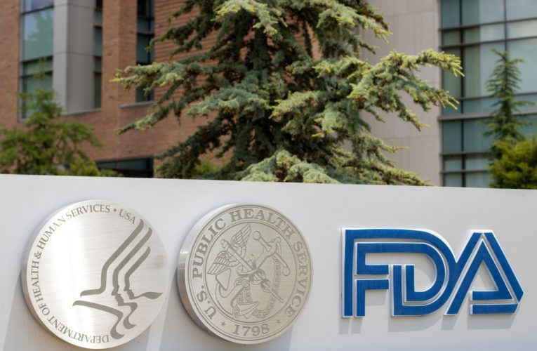 The U.S. Department of Health and Human Services (HHS), U.S. Public Health Service (USPHS) and FDA logos are seen at the FDA headquarters