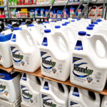 A view of a display of several containers of Roundup weed killer at a local home improvement store.