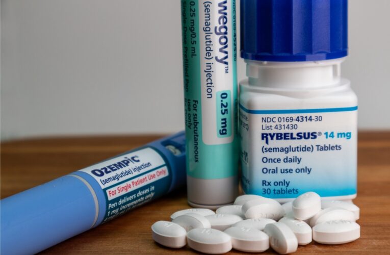 Ozempic, wegovy and Rybelsus semaglutide medications close up on wooden table